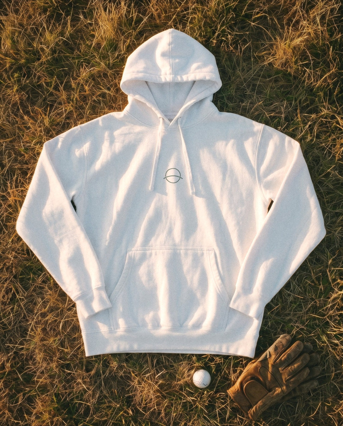 White Flyover Hoodie flat lay, forest mono mark on the chest
