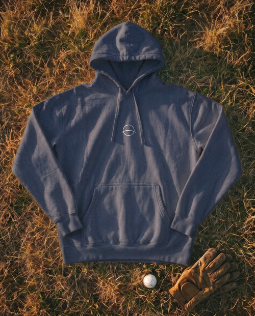 True Navy Flyover Hoodie flat lay, mono mark on the chest
