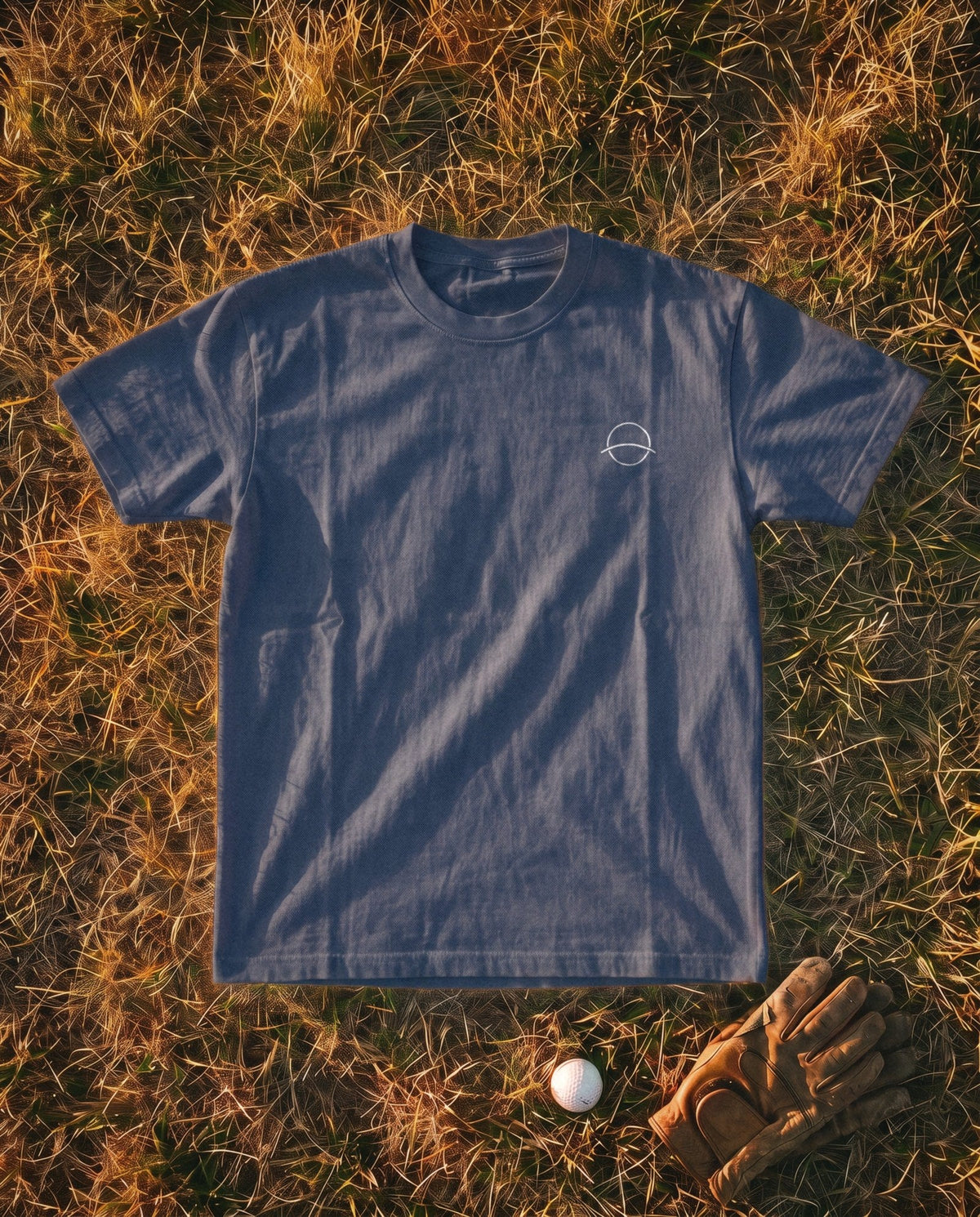 True Navy Flyover Tee flat lay, mono mark on the left chest